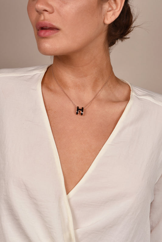 Black heirloom-inspired pendant on delicate rose gold necklace for women