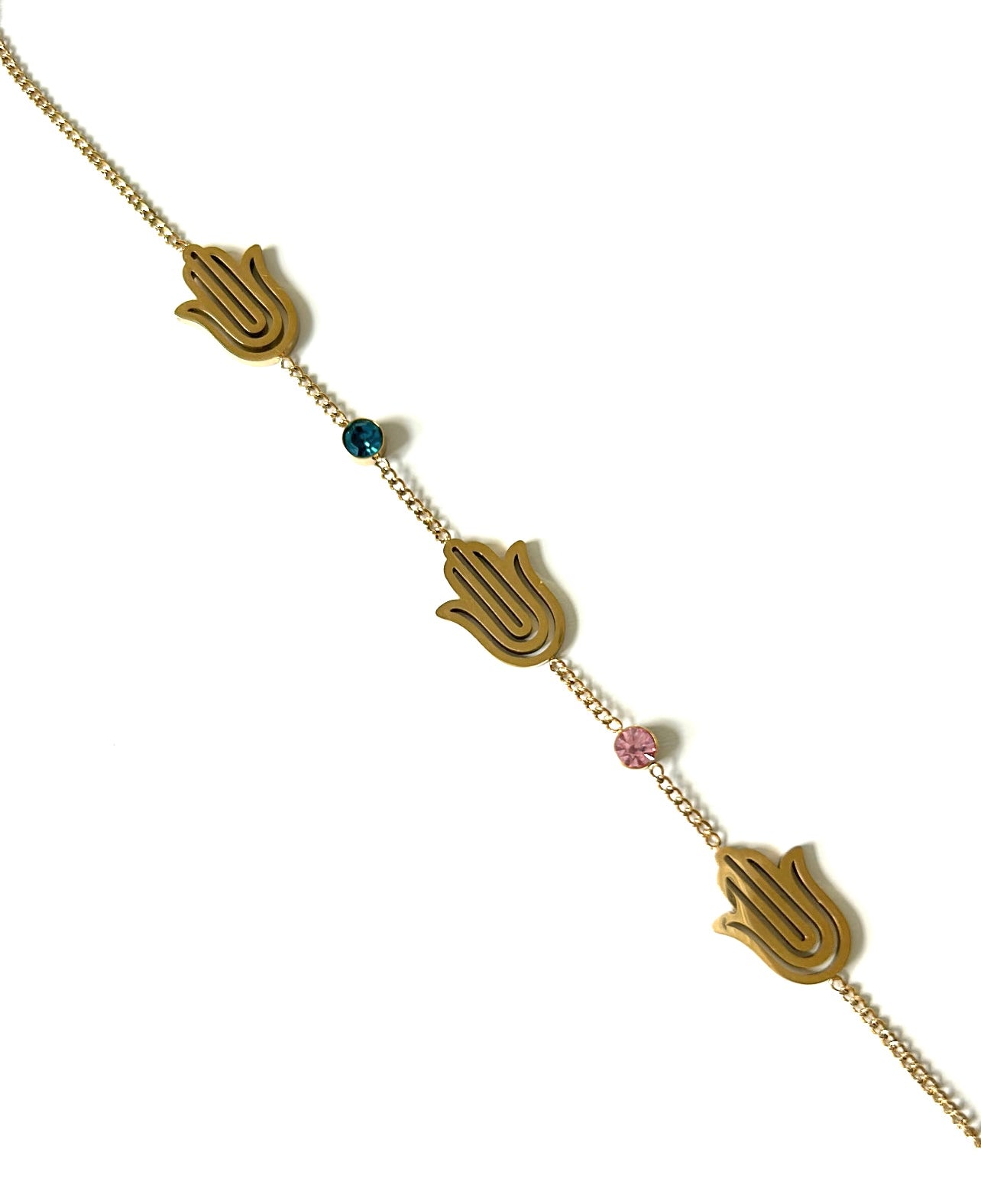 Elevate your style with the Horizon’s Watch Bracelet, a masterpiece of sophistication and elegance. Crafted from durable stainless steel and plated with three luxurious coats of 18k gold, this bracelet seamlessly blends durability with opulence. The centrepiece of this stunning accessory is an intricately designed evil eye motifs, embellished with high-end zircon accents for a touch of shimmering allure. Perfect for adding a hint of glamour to any outfit, the Horizon’s Watch Bracelet is not just a piece of
