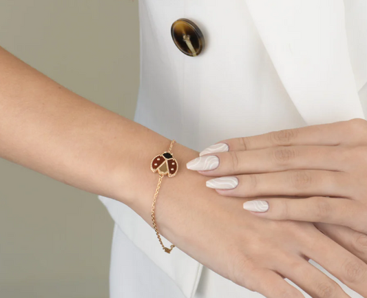 Lucky Spring inspired bracelet featuring red pearl ladybug wings