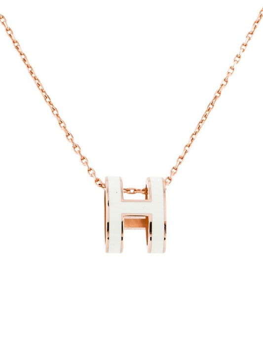 Gold Mini Pop H necklace featuring white enamel pendant