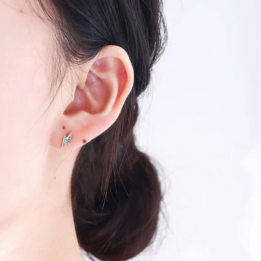  925 sterling silver base
• 18K gold PVD plating for long-lasting shine
• Multi-colour diamond simulants
• Mini lightning bolt design
• Lightweight and comfortable for everyday wear
• Hypoallergenic &amp; tarnish-resistant
• Perfect for stacking or wearing solo
• Ideal for gifting or adding a playful luxe touch