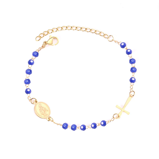 Introducing our "Azure Grace" Rosary – a divine fusion of celestial elegance and timeless craftsmanship. Crafted with stainless steel dipped in lustrous 18k gold, this sacred strand is adorned with royal blue pearls, each bead a symbol of serenity and devotion.