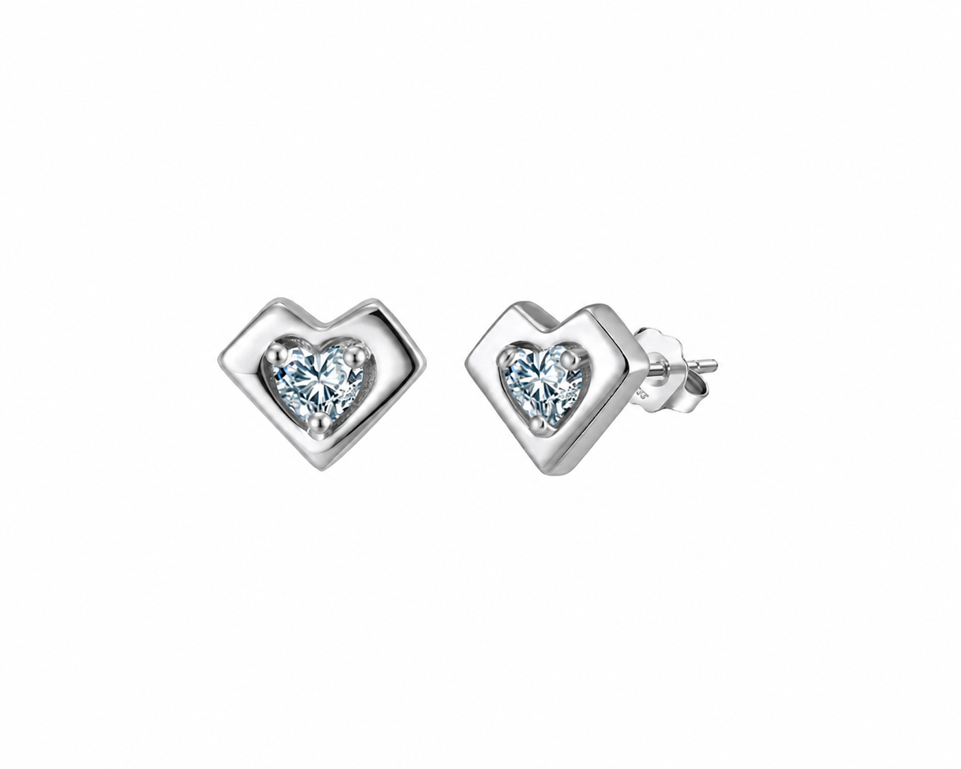 Elevate your everyday style with the Heart Solitaire Stud Earrings.&nbsp;Designed with a timeless heart silhouette, each earring features a brilliant heart-shaped diamond simulant that captures the light beautifully, creating an elegant sparkle for every occasion.

Crafted from premium 925 Sterling Silver and finished with a luxurious Rhodium Plating, these earrings offer lasting shine while helping protect against tarnishing. Their classic design makes them perfect for daily wear, special occasions, giftin