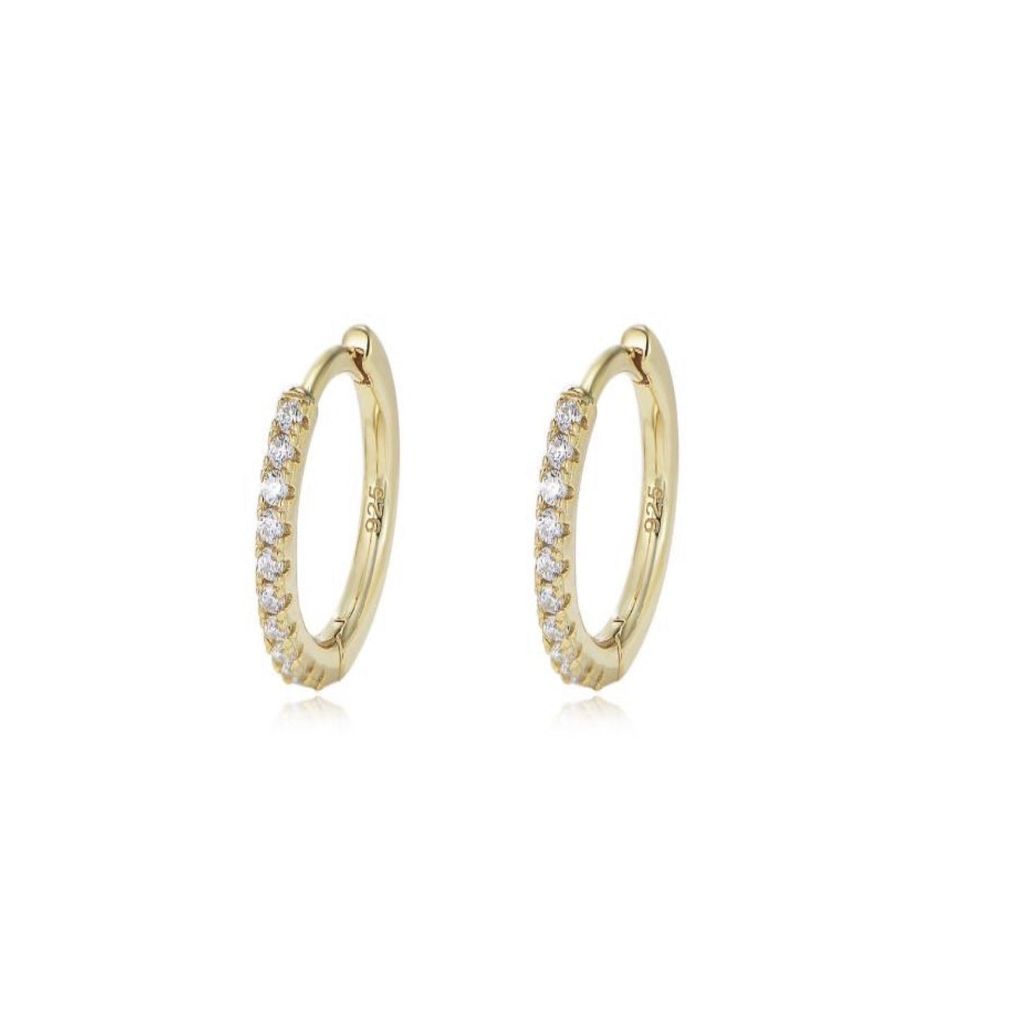 Gold hoop earrings with embedded stones on a white background