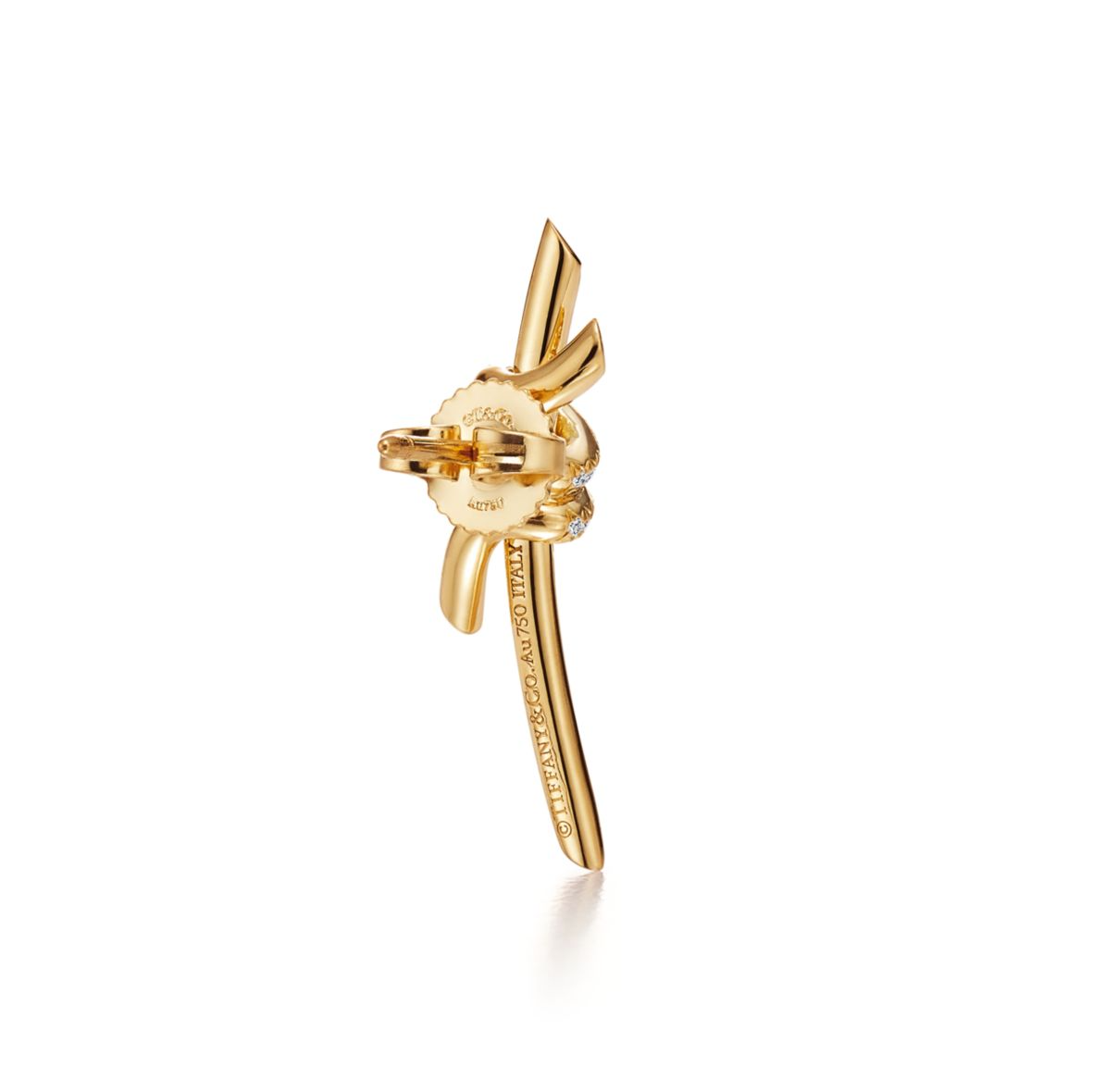 Inspired by the timeless elegance of classic design, the Knot of Love Earrings embody the strength of unbreakable bonds and cherished connections. Each piece is meticulously crafted in 18k yellow gold and adorned with hand-set round brilliant diamonds, chosen for their exceptional sparkle and precision. The design symbolizes unity, making these earrings a modern expression of love, devotion, and enduring beauty. 
