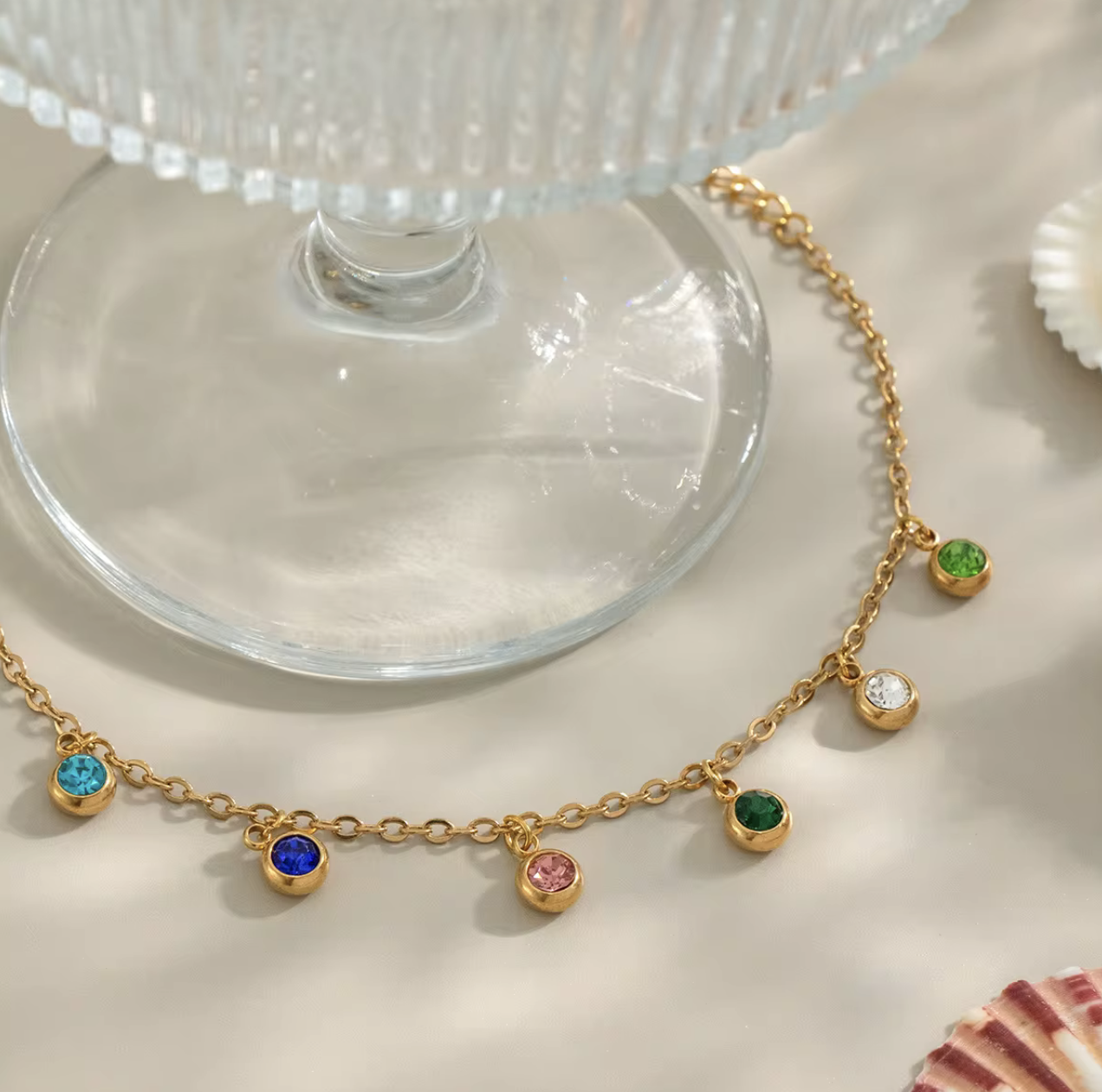 Radiate color and confidence with the&nbsp;Celestial Spectrum Bracelet — a luminous piece that captures the beauty of the cosmos. Crafted from premium stainless steel and dipped in rich gold, this bracelet features a stunning array of multi-coloured diamond simulants that shimmer with every movement.

Elegant yet playful, it’s the perfect statement of luxury for everyday wear or a special night out. The celestial hues reflect light like a starry sky — bold, radiant, and utterly unforgettable.