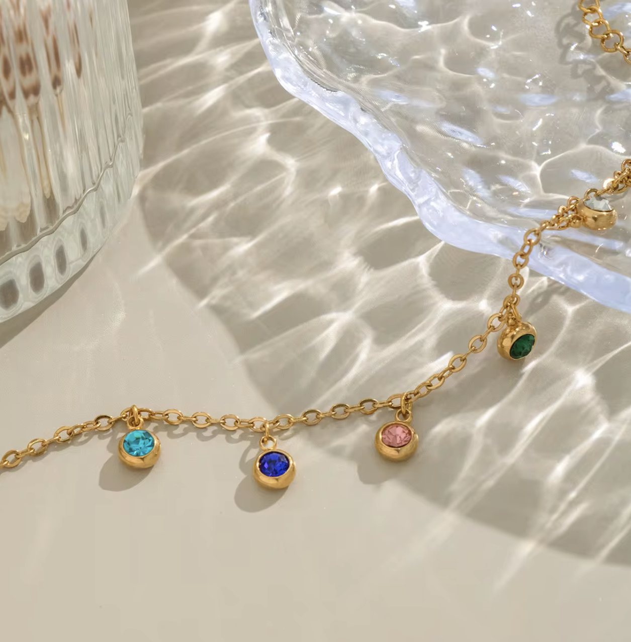 Radiate color and confidence with the&nbsp;Celestial Spectrum Bracelet — a luminous piece that captures the beauty of the cosmos. Crafted from premium stainless steel and dipped in rich gold, this bracelet features a stunning array of multi-coloured diamond simulants that shimmer with every movement.

Elegant yet playful, it’s the perfect statement of luxury for everyday wear or a special night out. The celestial hues reflect light like a starry sky — bold, radiant, and utterly unforgettable.