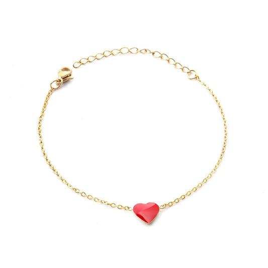 Styled for any occasion - a model wears the 'Cherry Love' bracelet, a stainless steel beauty dipped in 18k gold, adding a touch of sophistication to her ensemble. Eco-friendly and chic packaging for our 'Cherry Love' bracelet, reflecting our commitment to quality and sustainability. A side-by-side comparison of the 'Cherry Love' bracelet on various skin tones, showcasing its versatility and beauty for every individual.