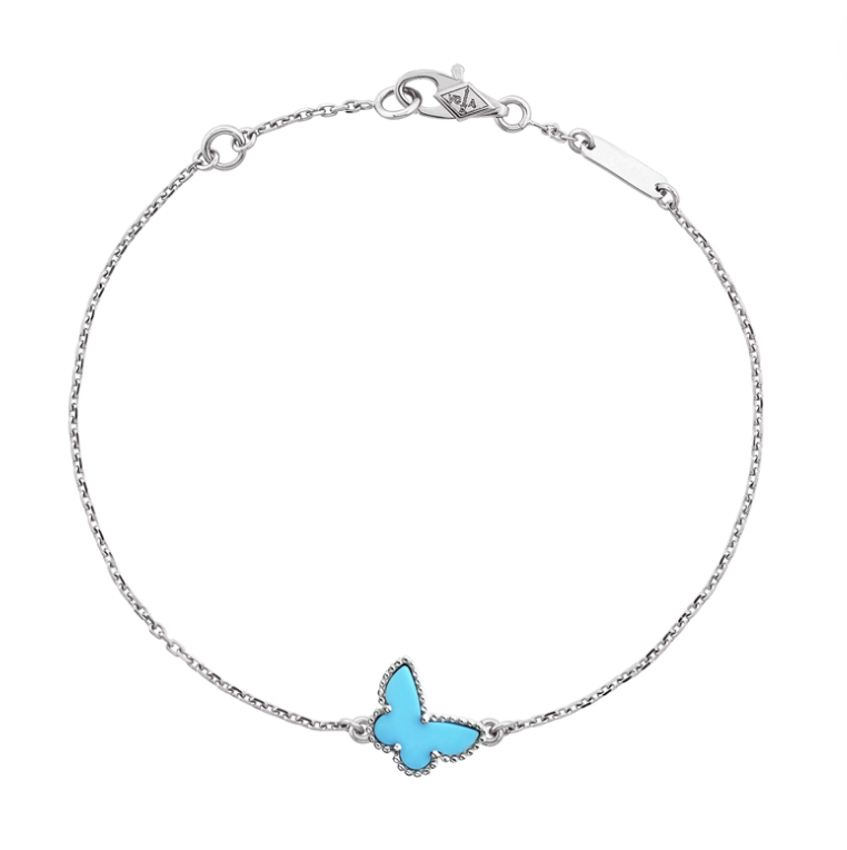 Make sure your style takes flight with our Fly Away bracelet! Made with delicate mother of pearl in blue and white gold, this butterfly-shaped accessory is sure to make a statement—this arm party is ready to spread its wings and soar.