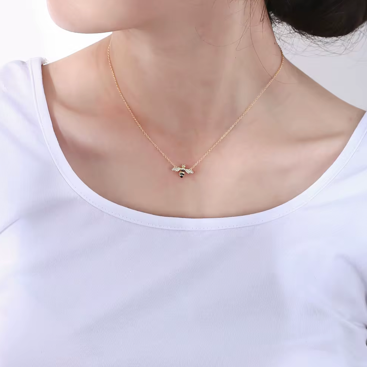 Key Features

• 925 sterling silver base
• 18K gold PVD plating for long-lasting shine
• Clear diamond simulants
• Clear diamond simulant centre stone
• Bee mini design
• Lightweight and comfortable for everyday wear
• Hypoallergenic &amp; tarnish-resistant
• Perfect for stacking or wearing solo
• Ideal for gifting or everyday luxury