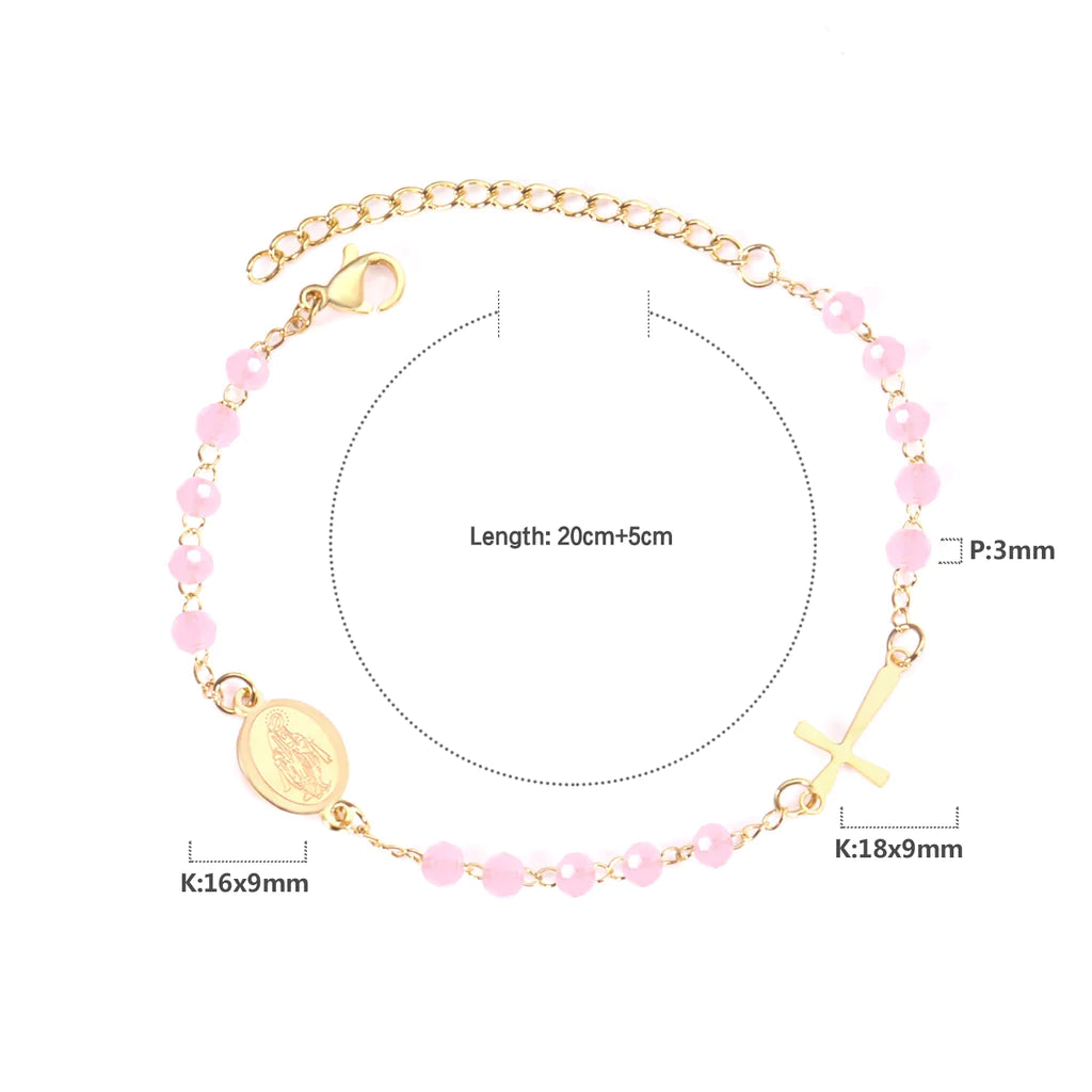 Introducing the 'Blush Blessings Rosary' – where spirituality meets a touch of rosy radiance! This stainless steel beauty dipped in 18k gold boasts enchanting pink beads and a divine 18k gold cross. At 20 cm, it's a harmonious blend of elegance and charm, with an extra 5 cm extension for those days when your style craves a little more grace.