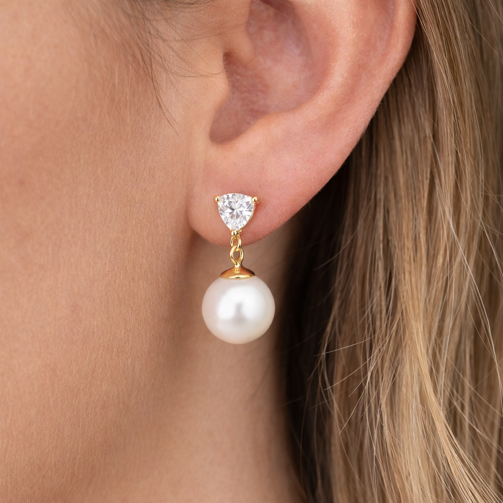  premium 925 sterling silver and finished with 18K gold PVD plating, The Trinity Pearl Drops offer lasting shine, durability, and a polished luxurious finish. 